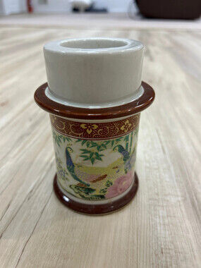 Vintage porcelain candle holder decorated with Peacock and floral motif
